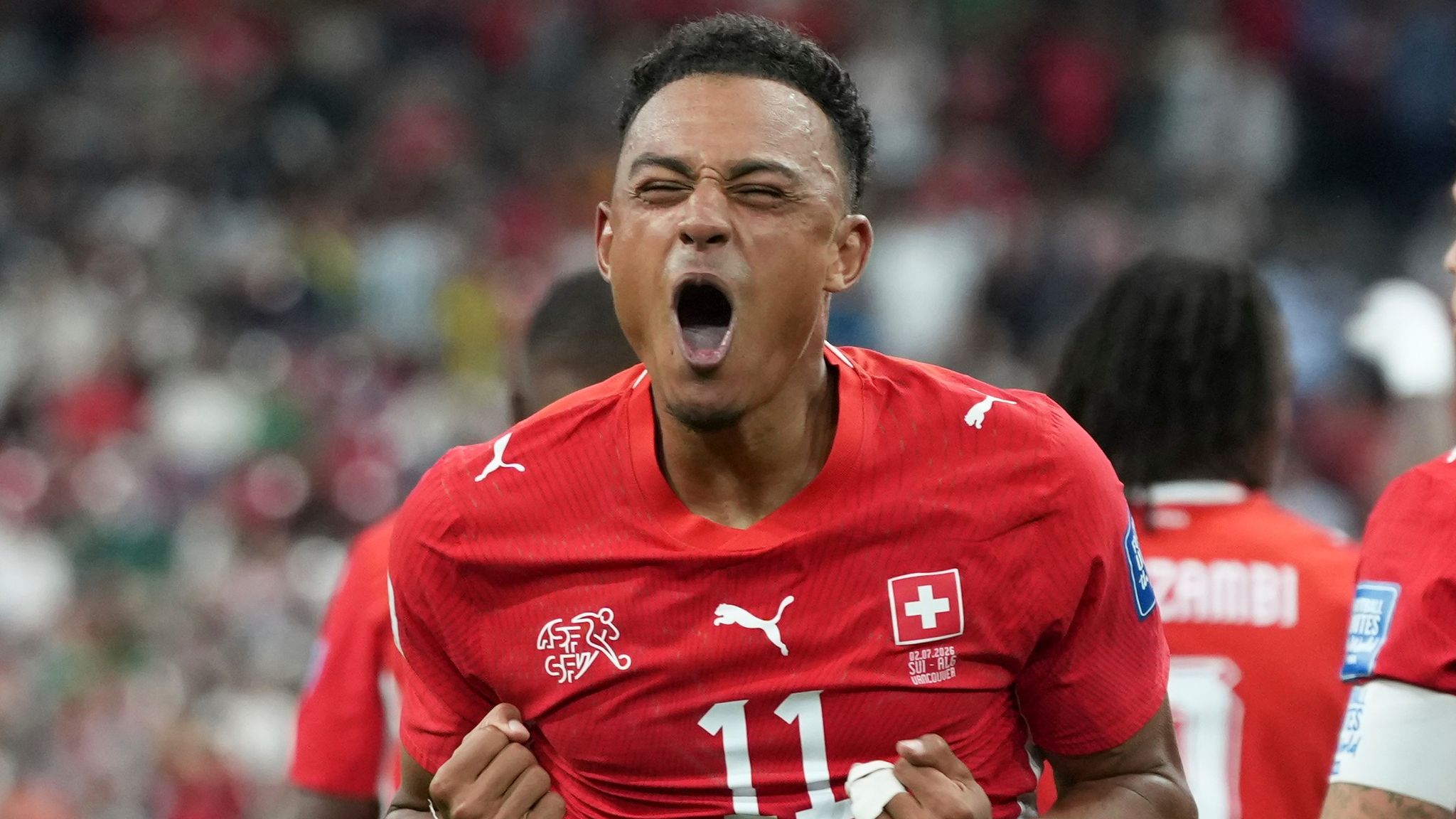 Switzerland's Dan Ndoye (11) celebrates after scoring his side's second goal
