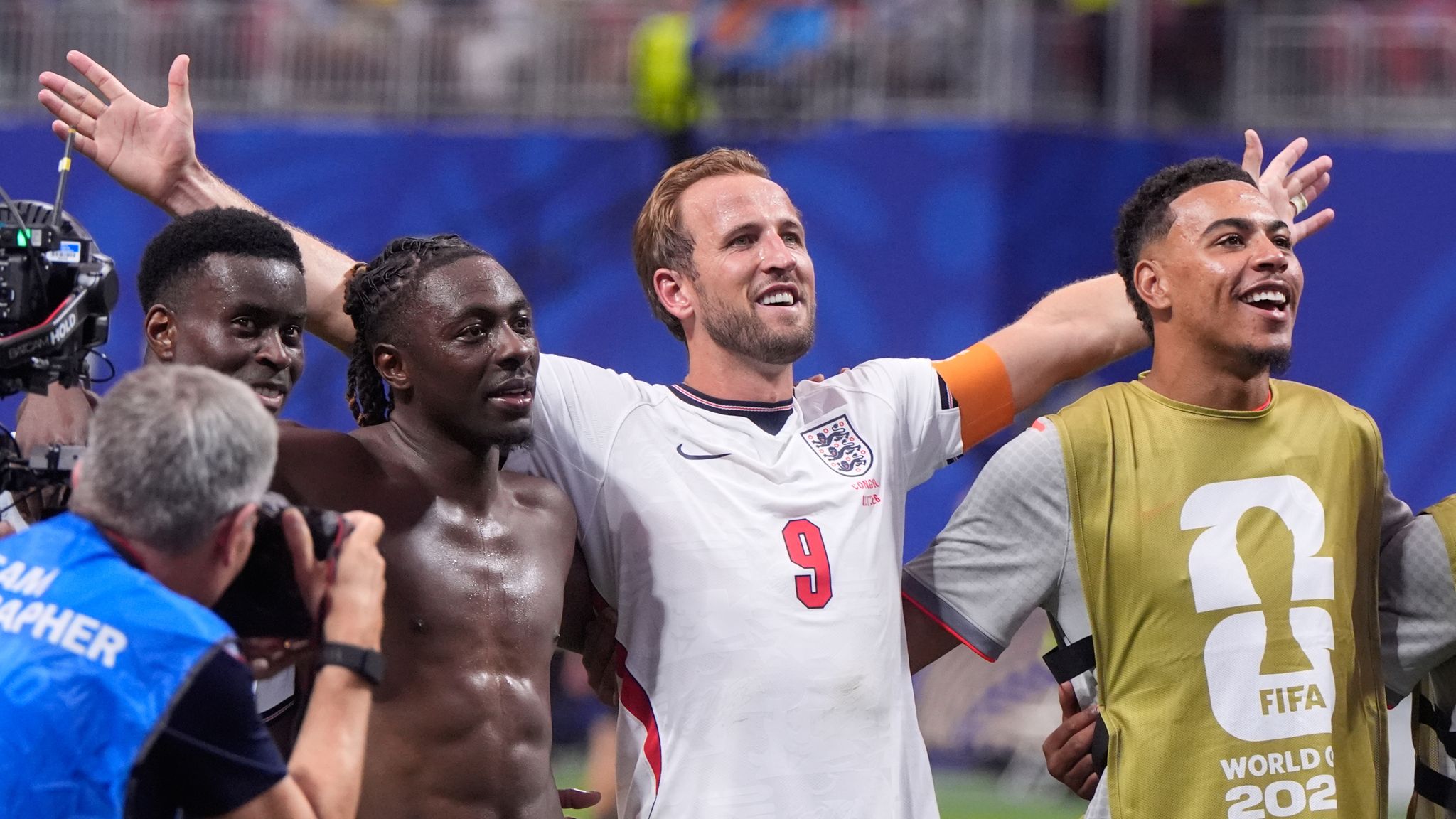 England players, led by captain Harry Kane, celebrate in front of fans at full time (AP Photo/Mike Stewart)