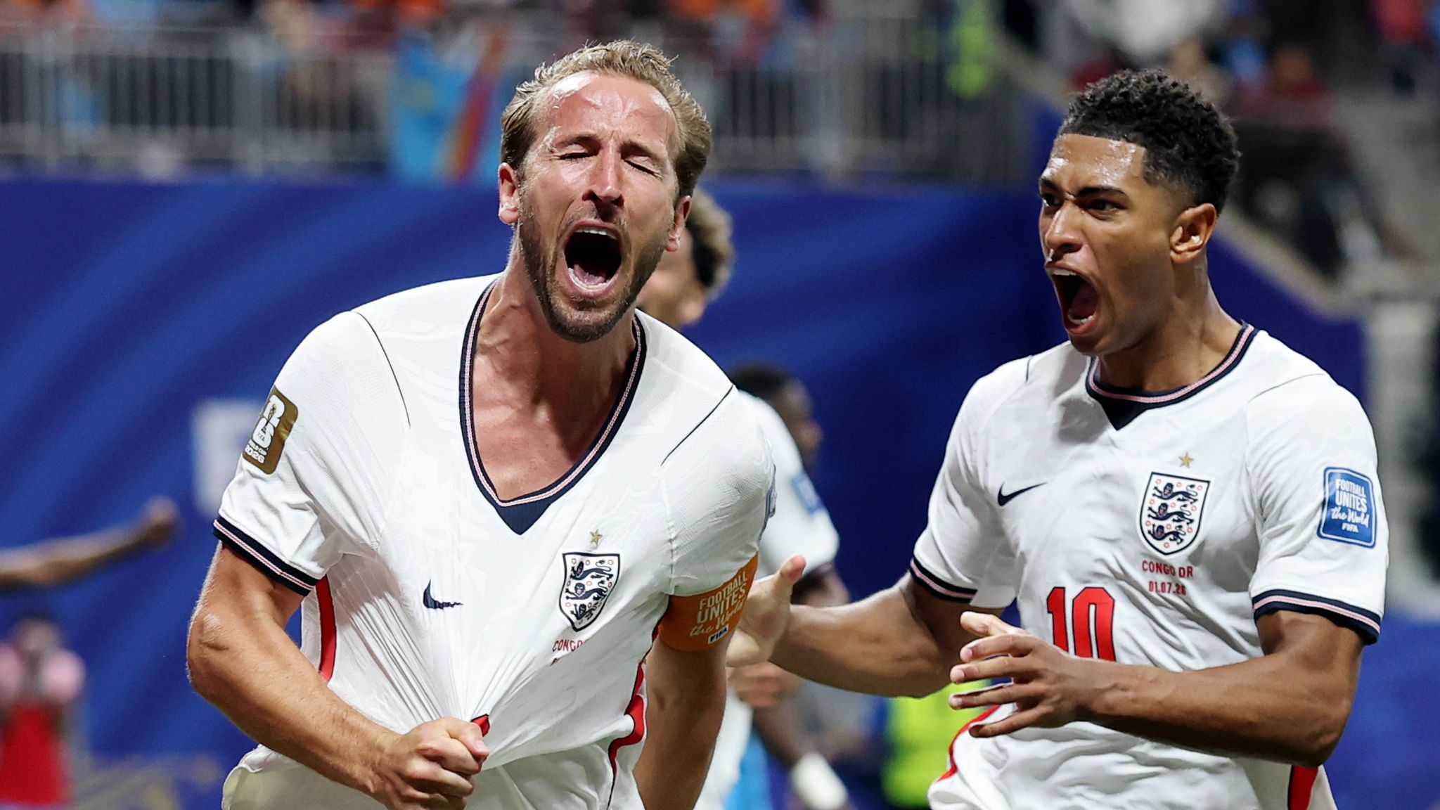 Harry Kane celebrates with Jude Bellingham after levelling for England