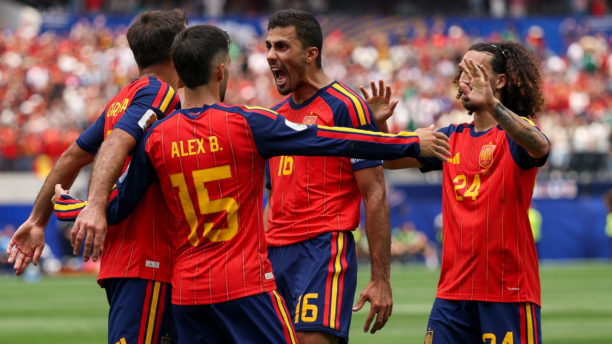 Spain's players celebrate Mikel Oyarzabal's opener against Austria at the World Cup