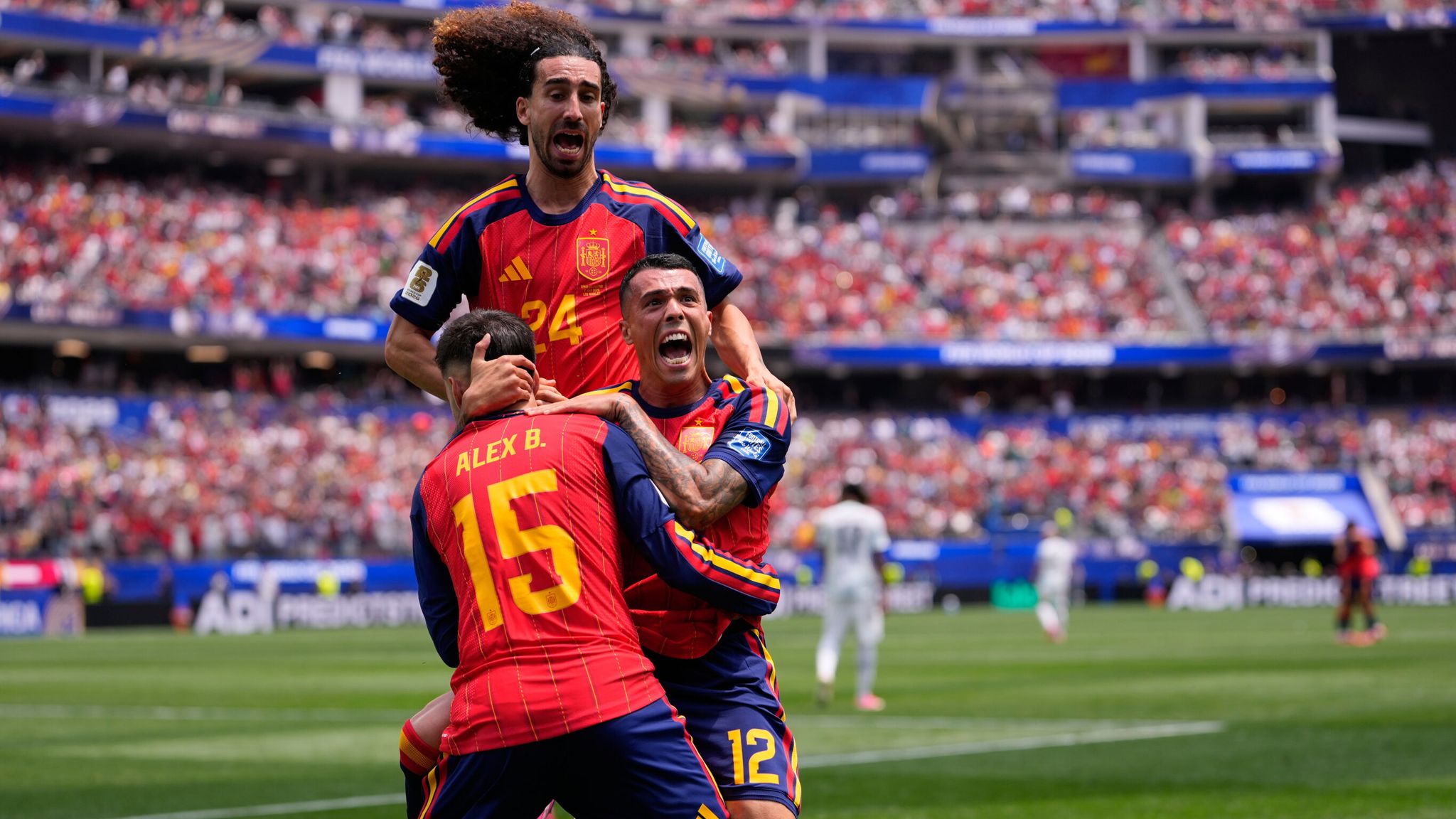 Spain's Pedro Porro celebrates scoring his side's second goal against Austria with teammates during the World Cup round of 32