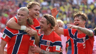 Norway's Erling Haaland celebrates with team-mates after scoring his second goal against Brazil