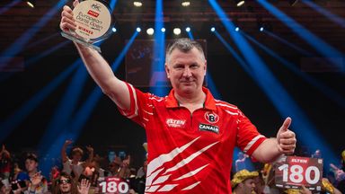 Krzysztof Ratajski celebrates victory in Leverkusen [Sebastian Doppstadt/PDC Europe]