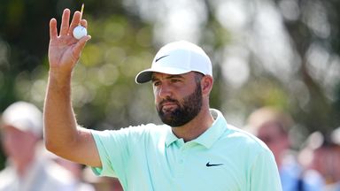 Scottie Scheffler acknowledges the crowd after putting a birdie on the third green during day one of The Open