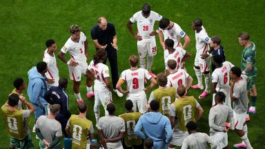 Tuchel speaks to players during a hydration break