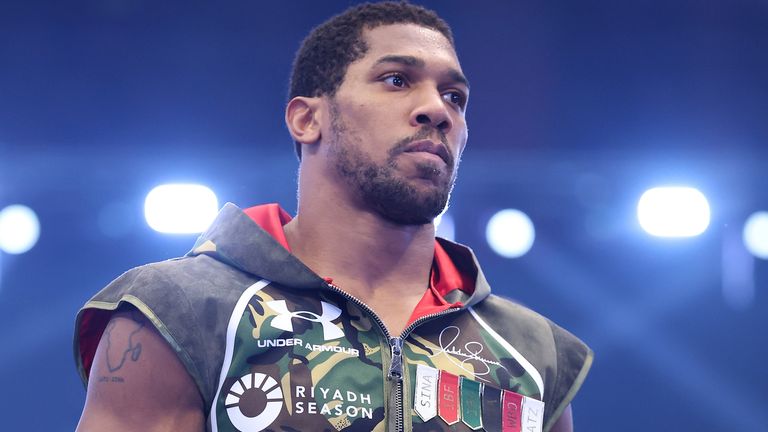 Anthony Joshua walks to the ring ahead of his meeting with Kristian Prenga in Jeddah