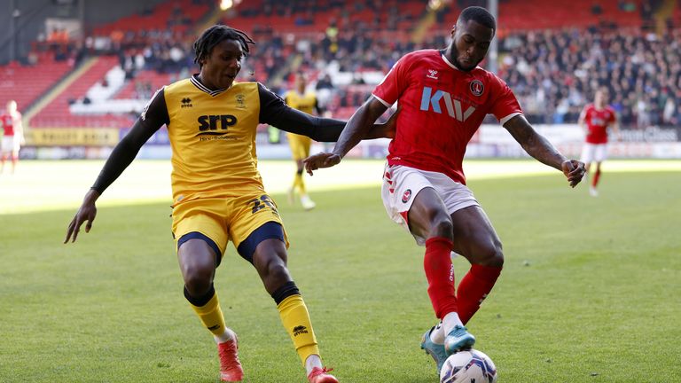 Norton-Cuffy competes for the ball when playing in League One