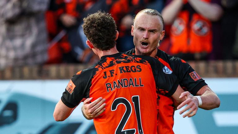 Dundee United's Lachlan Rose celebrates his openeragainst Rangers
