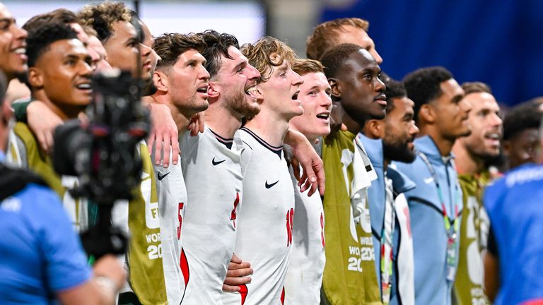 England players unite to sing with fans