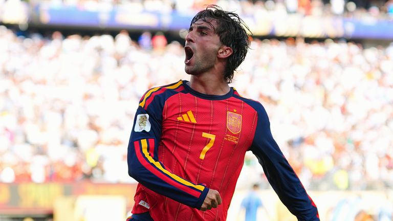 Spain's Ferran Torres celebrates scoring their winner (AP Photo/Julio Cortez)