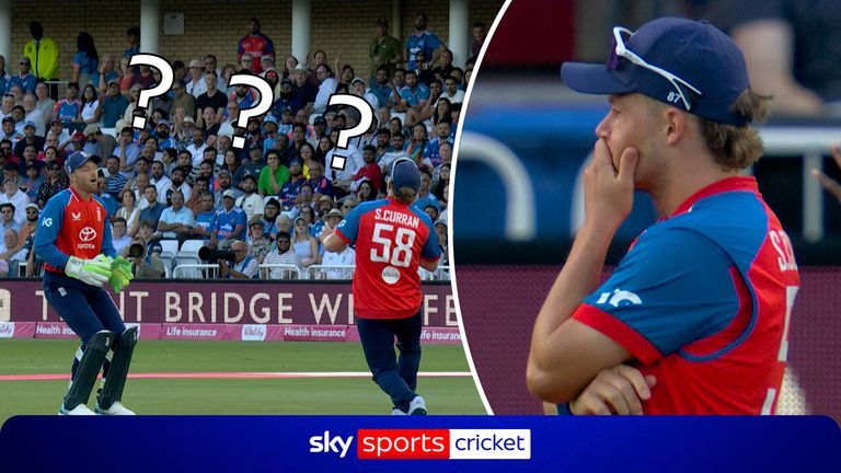 Jos Buttler and Sam Curran both look at each other in disbelief after confusion and miscommunication leads to both them missing a simple catch to dismiss Arshdeep Singh.