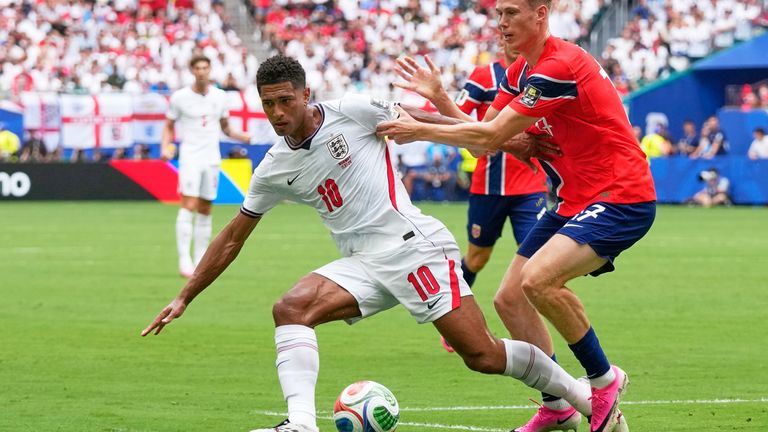 England's Jude Bellingham and Norway's Torbjoern Heggem battle for the ball