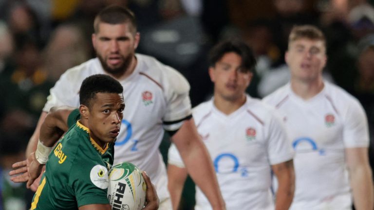 South Africa's scrum-half Grant Williams runs to score a try during the rugby Nations Championship match between South Africa and England at Ellis Park Stadium in Johannesburg on July 4, 2026. (Photo by PHILL MAGAKOE / AFP)