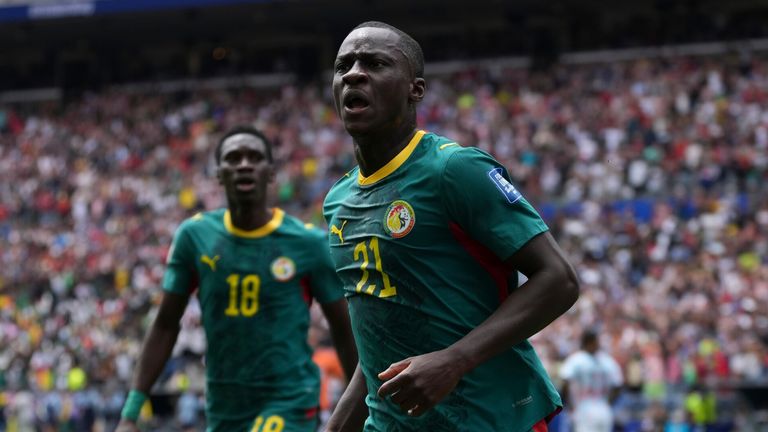 Senegal's Habib Diarra (21) celebrates his goal vs Belgium in the World Cup round of 32 (AP Photo/Abbie Parr)