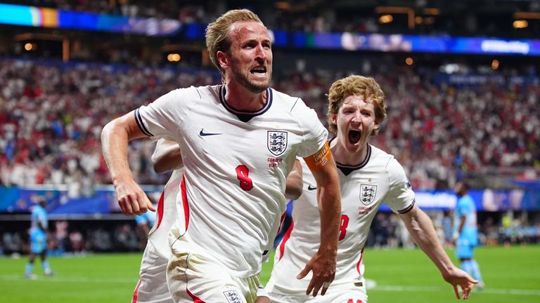 Harry Kane celebrates scoring England's first goal