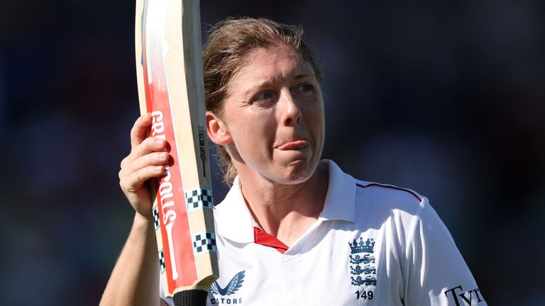 Heather Knight walks off the field at Lord's after her final innings for England before retirement