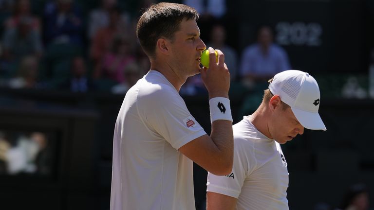 Henry Patten (L) and Harri Heliovaara (R). (AP Photo/Kirsty Wigglesworth)