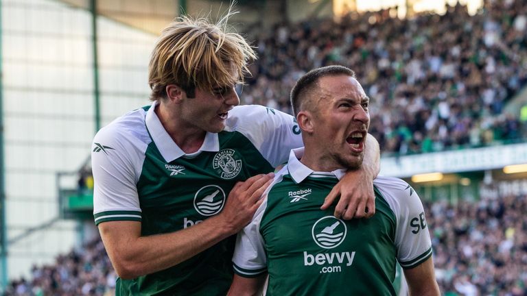 Hibs' Felix Passlack (R) celebreates with Nathan Lowe (L) after scoring to make it 2-0 during a UEFA Conference League