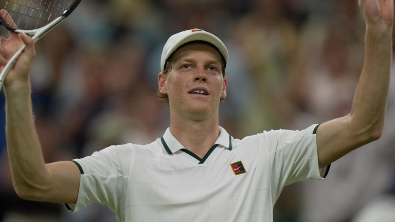 Jannik Sinner of Italy celebrates his victory against Shintaro Mochizuki of Japan in their fourth round men's singles match at the Wimbledon Tennis Championships in London, Sunday, July 5, 2026. (AP Photo/Brian Inganga)