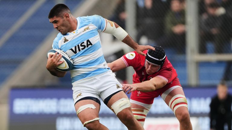 Argentina's Joaquin Oviedo is tackled by Adam Beard 