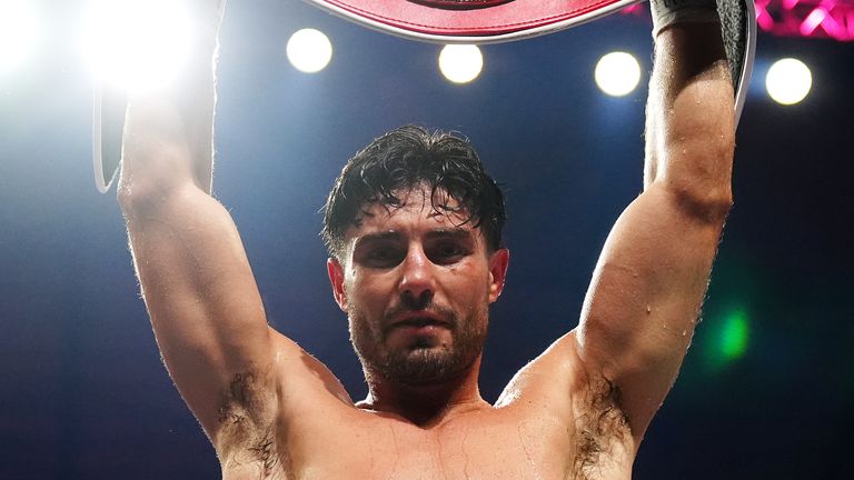 Josh Kelly celebrates defeating Bakhram Murtazaliev after their IBF World Super Welterweight bout
