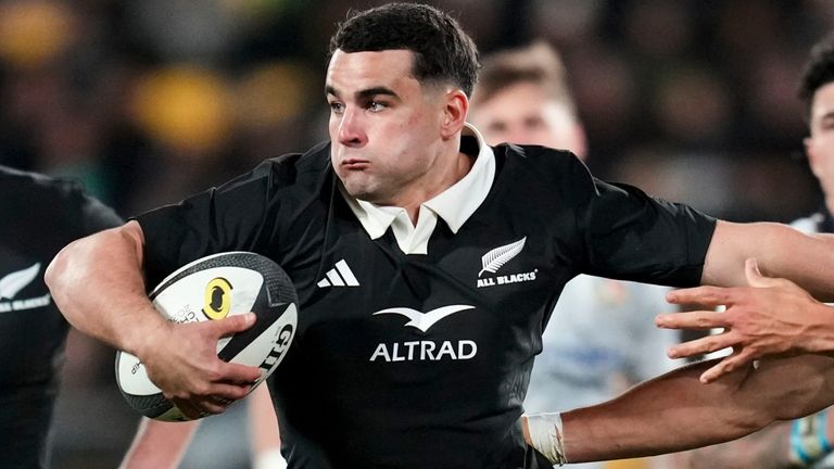 Josh Moorby fends off a defender during his impressive New Zealand debut (Marty Melville/Photosport via AP)