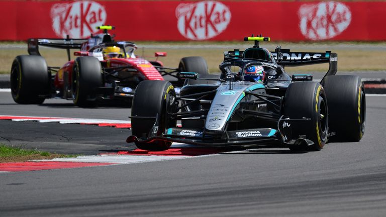 Mercedes' Italian driver Kimi Antonelli leads Ferrari's British driver Lewis Hamilton during the sprint race ahead of the Formula One British Grand Prix at the Silverstone motor racing circuit in Silverstone, central England, on July 4, 2026. (Photo by Andrej ISAKOVIC / AFP)