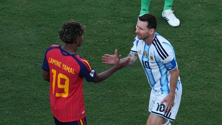 Lamine Yamal and Lionel Messi embrace after the World Cup final.