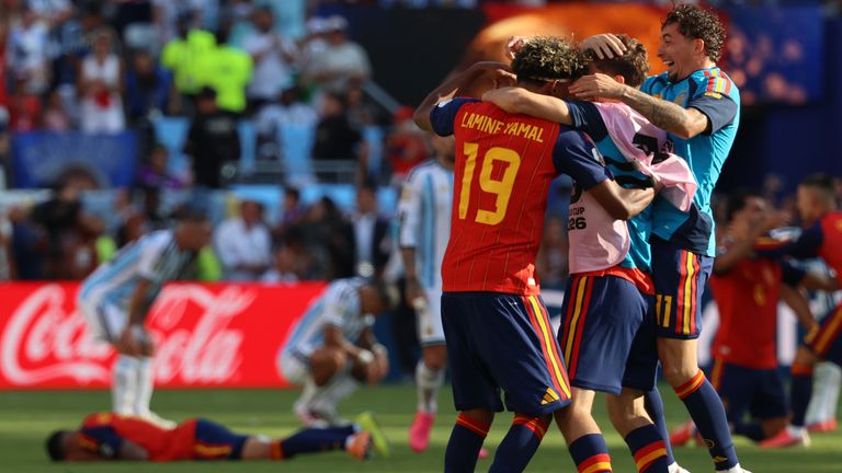 Spain's Lamine Yamal embraces teammates after Spain won the World Cup (AP Photo/Pamela Smith)
