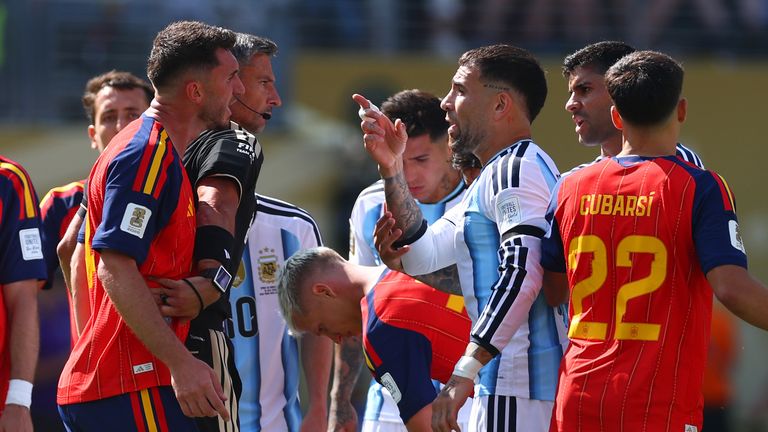 Nicolas Otamendi was deep in conversation with Aymeric Laporte after full-time