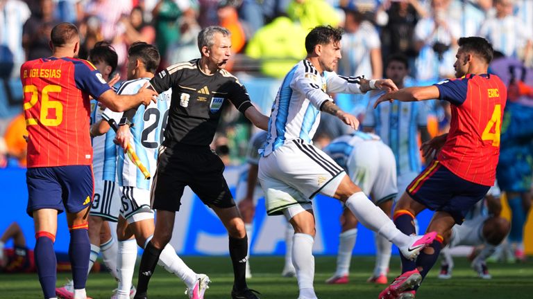 Argentina's Leandro Paredes clashed with Spain's Eric Garcia after the World Cup final, kicking off a duel between the two nations