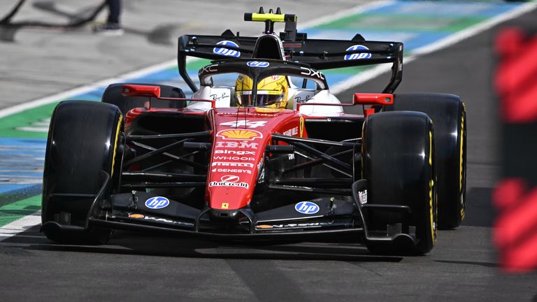 Ferrari driver Lewis Hamilton of Britain leaves the pitch during a qualifying session ahead of the Formula One Hungarian Grand Prix auto race, at the Hungaroring racetrack in Mogyorod, near Budapest, Hungary, Saturday, July 25, 2026. (Attila Kisbenedek/Pool Photo via AP)