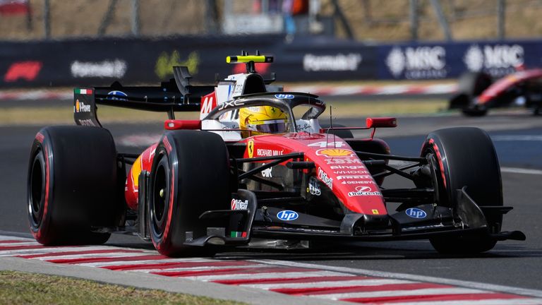 Ferrari driver Lewis Hamilton of Britain steers his car during a qualifying session ahead of Sunday's Formula One Hungarian Grand Prix auto race, at the Hungaroring racetrack in Mogyorod, near Budapest, Hungary, Saturday, July 25, 2026. (AP Photo/Darko Bandic)