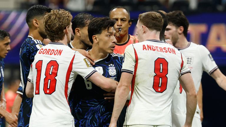 Lisandro Martinez confronts Elliot Anderson after a foul on Lionel Messi (AP Photo/Erik S. Lesser)