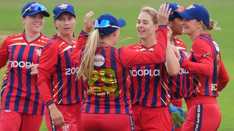 Manchester Super Giants players celebrate the wicket of London Spirit's Amy Jones in The Hundred