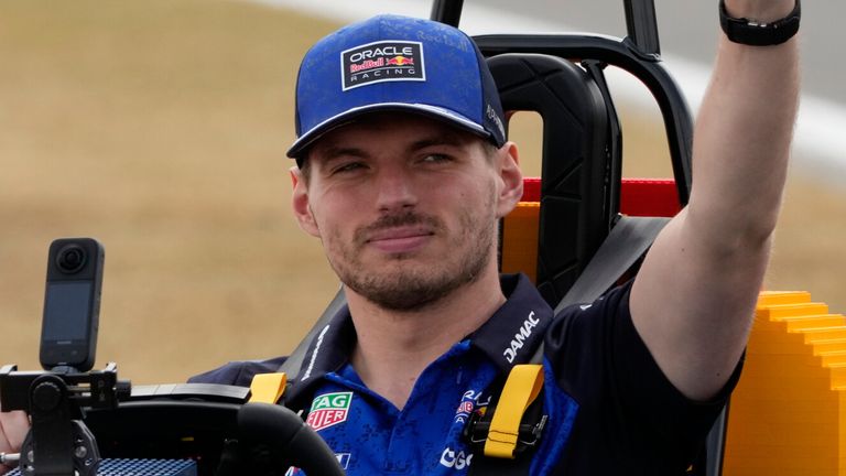 Red Bull driver Max Verstappen of the Netherlands drives Lego replica F1 car during driver's parade prior to the British F1 Grand Prix, in Silverstone, England, Sunday, July 5, 2026. (AP Photo/Darko Bandic)