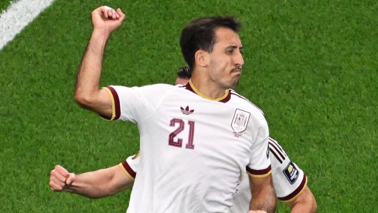 Spain's Mikel Oyarzabal (21) celebrates scoring their first goal on a penalty kick during the World Cup semifinal soccer match against France in Arlington, Texas, near Dallas, Tuesday, July 14, 2026. (AP Photo/Jessica Tobias)