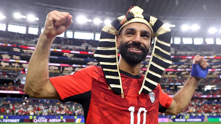 Mohamed Salah celebrates following Egypt's penalty shootout win over Australia