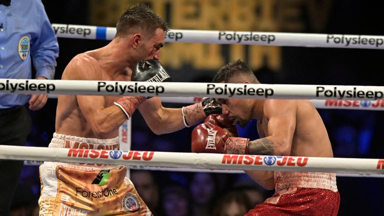 Jason Moloney, left, hits Saul Sanchez 