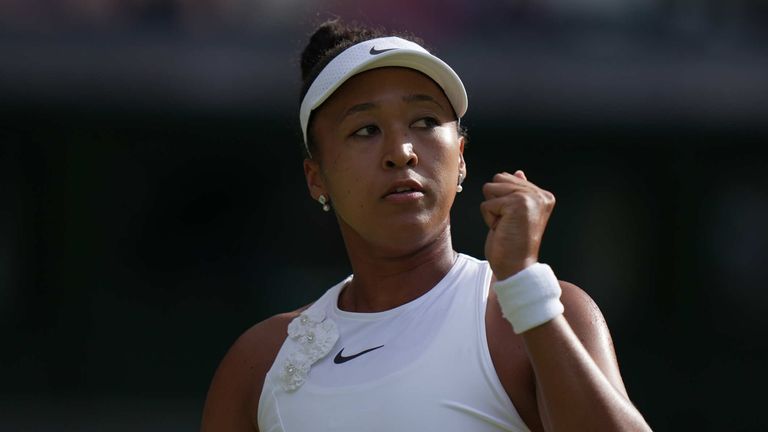 Naomi Osaka of Japan celebrates winning a point against Aryna Sabalenka of Belarus in their fourth round women's singles match at the Wimbledon Tennis Championships in London, Sunday, July 5, 2026. (AP Photo/Brian Inganga)