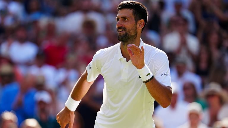 Novak Djokovic of Serbia celebrates victory following his Gentlemen's Singles match against Arthur Rinderknech of France on day five of the 