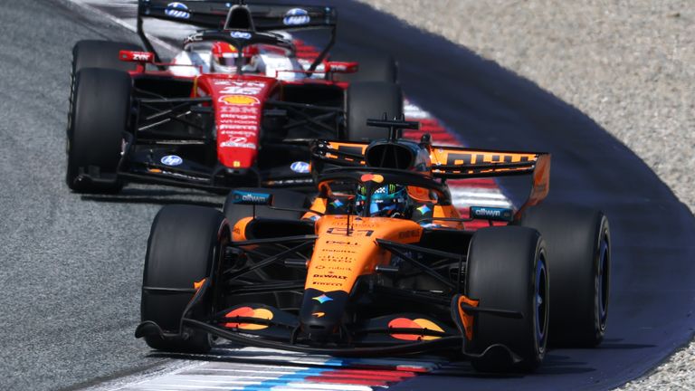 Oscar Piastri runs ahead of Charles Leclerc at the Red Bull Ring