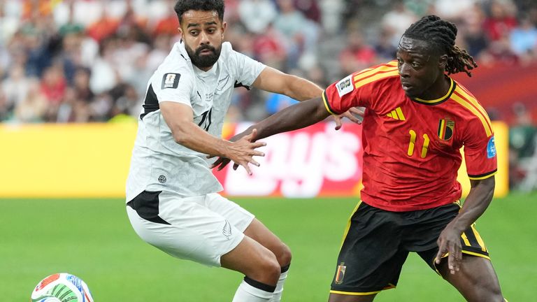 New Zealand's Sarpreet Singh (10) and Belgium's Jeremy Doku (11) battle for the ball during the World Cup Group G soccer match between New Zealand and Belgium in Vancouver, British Columbia, Friday, June 26, 2026. (AP Photo/Abbie Parr)