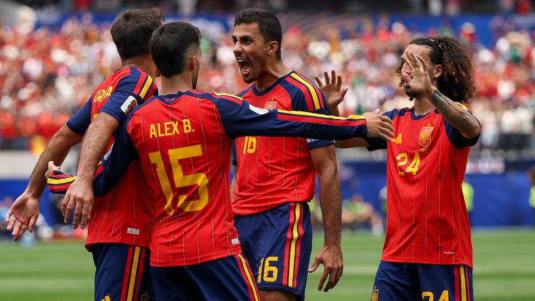 Spain's players celebrate Mikel Oyarzabal's opener against Austria at the World Cup