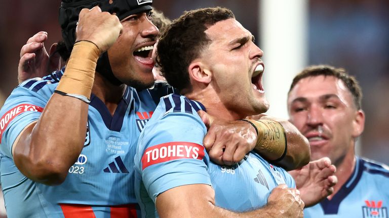 Nathan Cleary celebrates scoring New South Wales' opening try against Queensland in the State of Origin series decider