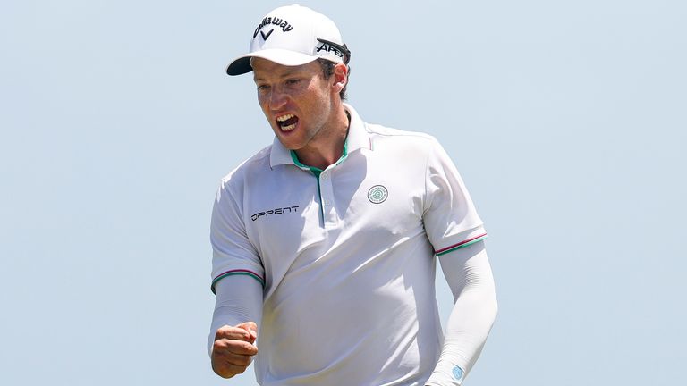 Stefano Mazzoli of Italy reacts after making a birdie on the 18th hole during the final round of the Corales Puntacana Championship