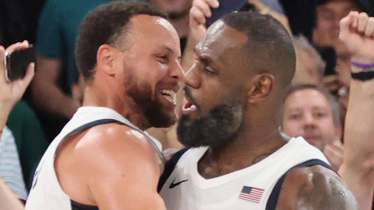 August 8, 2024, Paris, Ile de France, France: United States shooting guard Stephen Curry (4) and United States guard Lebron James (6) celebrate after the game against Serbia in a men's basketball semifinal game during the Paris 2024 Olympic Summer Games at Accor Arena. (Cal Sport Media via AP Images)