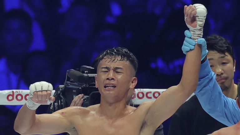 Japan's Yoshiki Takei celebrates after defeating Moloney 