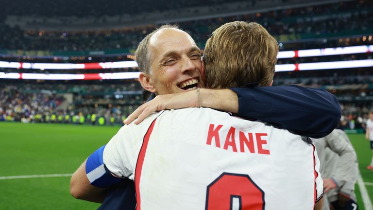 Thomas Tuchel embraces Harry Kane after England's 3-2 win over Mexico at the World Cup