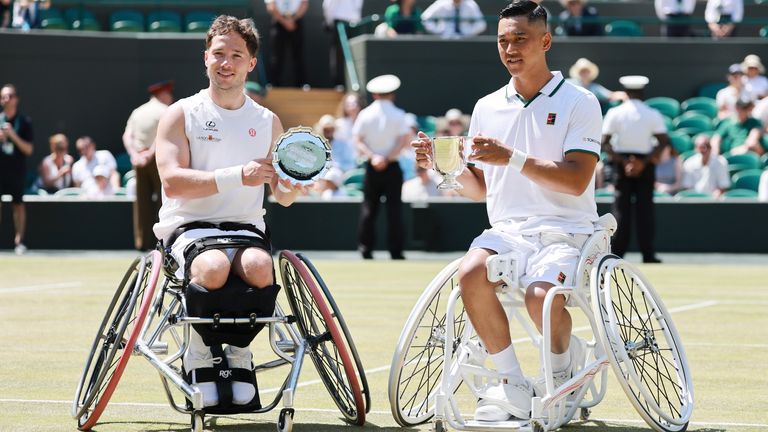Tokito Oda of Japan and Alfie Hewett of United Kingdom hold their trophies after the gentlemen's wheelchair singles final match on day fourt